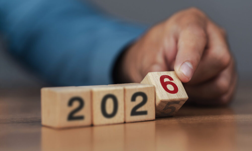 Business leaders reviewing strategy and financial goals for 2026 using ERP systems to manage rising costs