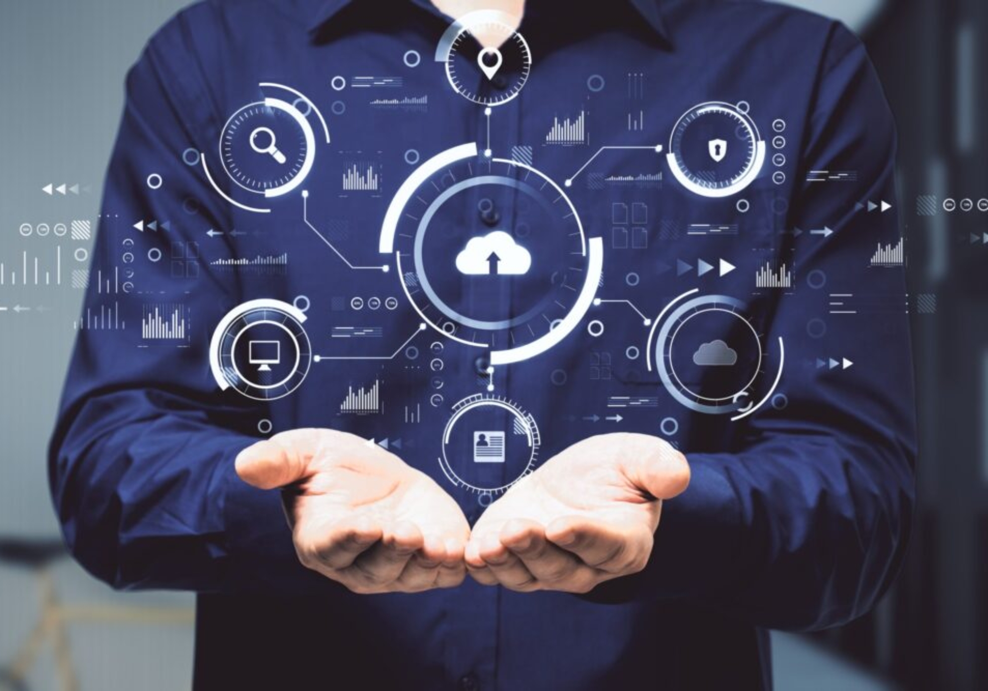 Hands holding abstract digital business interface symbolising cloud-native ERP and AI-driven insight for UK businesses